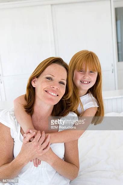 8,030 Redhead Mom Stock Photos & High